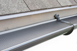 Gutter with a gutter cover installed by Buck Roofing in Kansas City